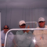 Mike McBride and some clients running from a "lil" rain storm.