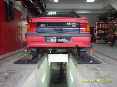 The wheel alignment pit