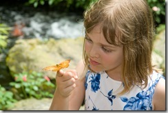 Lauren wonders why butterflies like to nibble her finger
