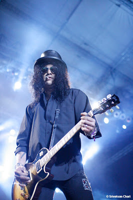 Slash looking into Srivatsan Chari's lens