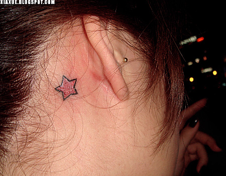 pink star tattoo