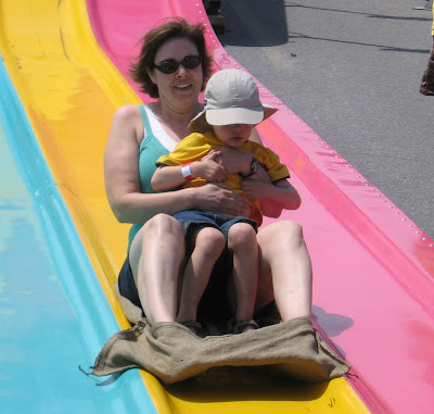 BigE and Mama going down the slide