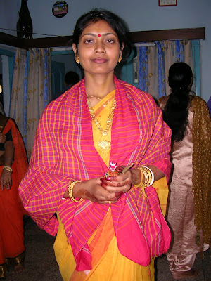 Cousin holding the kajol lata in her hand