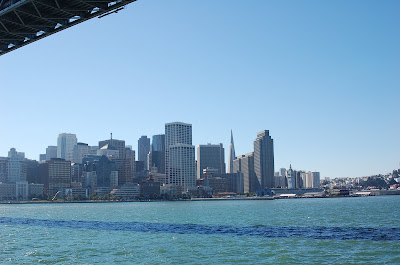 San Francisco skyline from ferry under Bay Bridge. Photo by Raymond R. Chambers