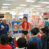 Things you don't see in the US: A man in his skivvies hawking beer coupons and beer mugs to kids