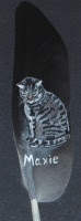Cat painted on feather