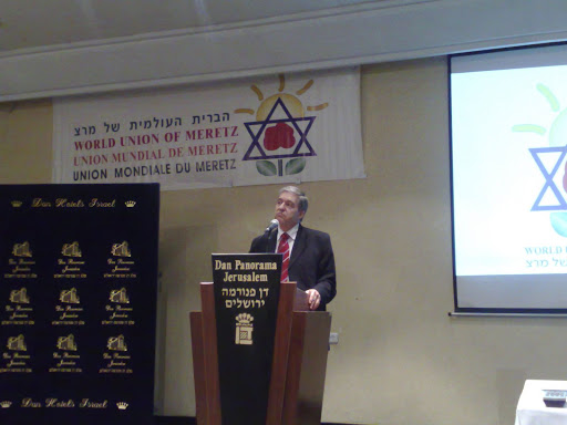 Meretz Chairman Yossi Beilin Addresses Symposium Participants