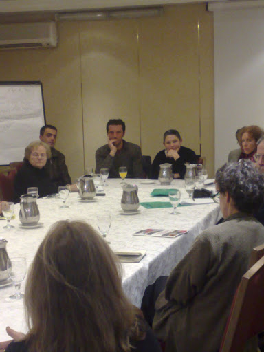 Participants talk with Givat Haviva's Lydia Aisenberg (center)