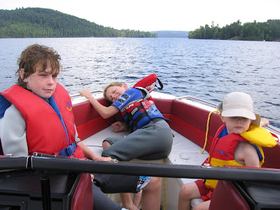 Kids in the bow of the boat
