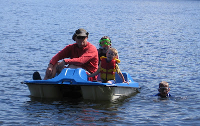 BigE and Dada in a pedal boat
