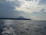 View of a volcano during our ferry ride from Manado to Siladen.