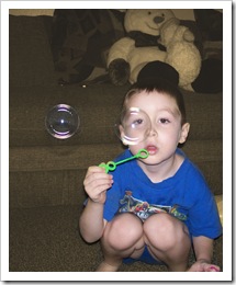 Nicholas blowing bubbles