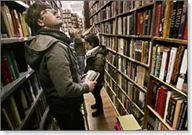 Customers peruse the goods at The Strand bookstore in New York City. Photo by Seth Wenig, AP.