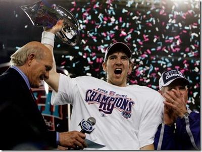 Quarterback Eli Manning #10 of the New York Giants holds the Vince Lombardi Trophy after defeating the New England Patriots 17 - 14 in Super Bowl XLII on February 3, 2008 at the University of Phoenix Stadium in Glendale, Arizona.